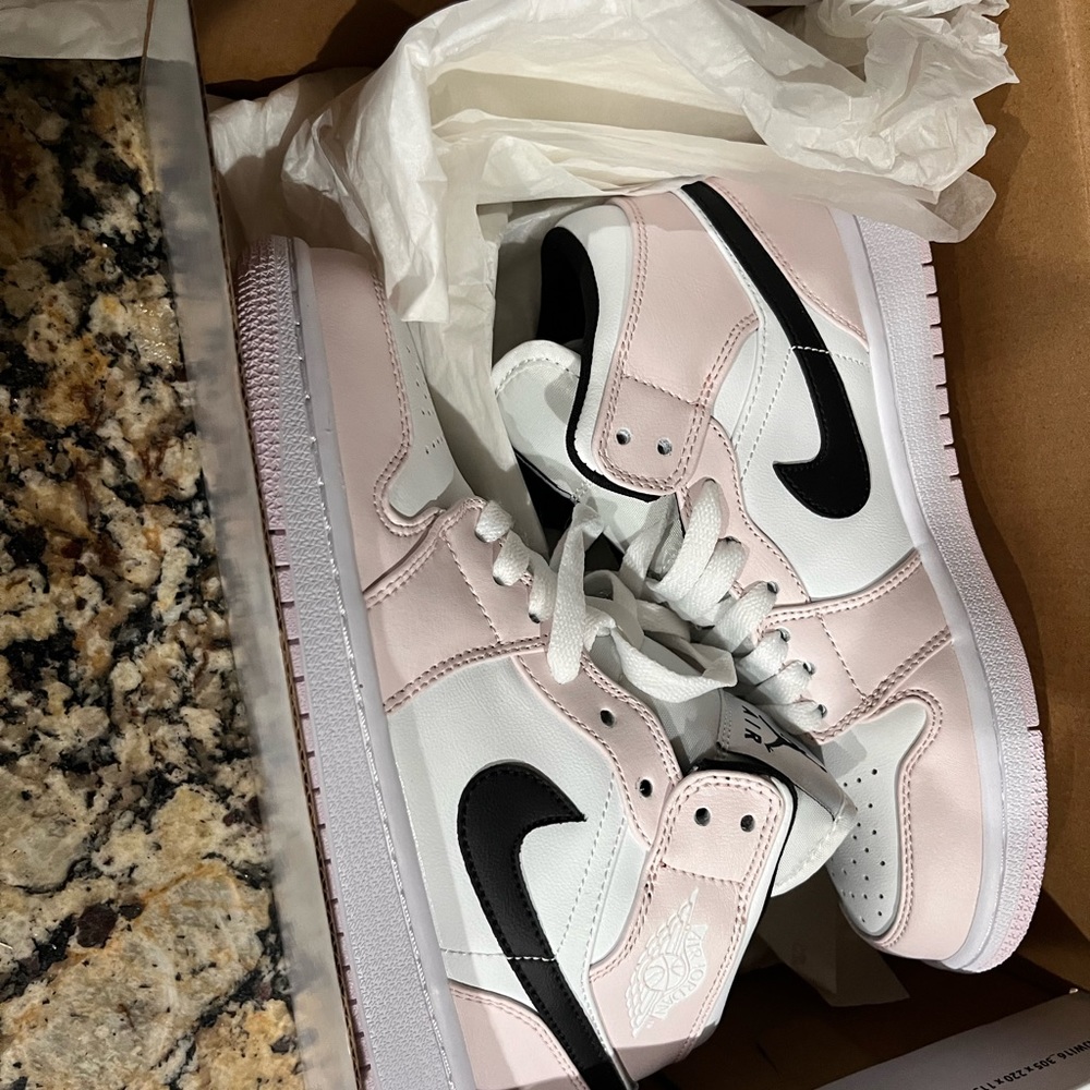 New Nike Air Jordan 1 Mid shoes. Color barely rose. Size US 6. Runs small.
